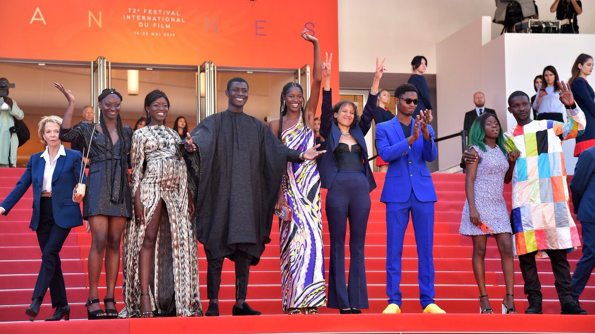 Mati Diop with cast from Atlantique at Cannes Film Festival